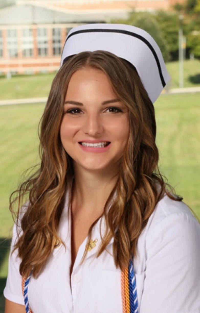 Kate 10 years later, still on her health journey, graduating nursing school